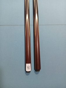 brown cue on table 2